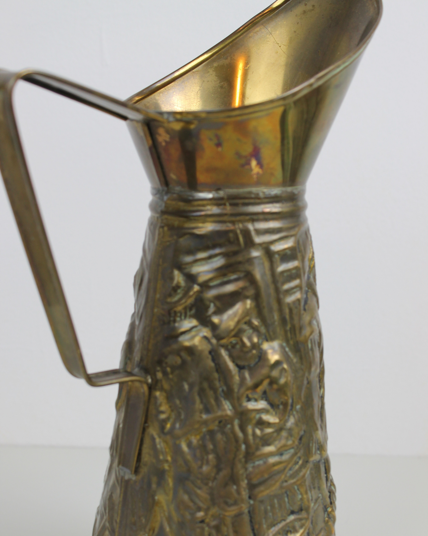 Vintage Brass Relief Pitcher