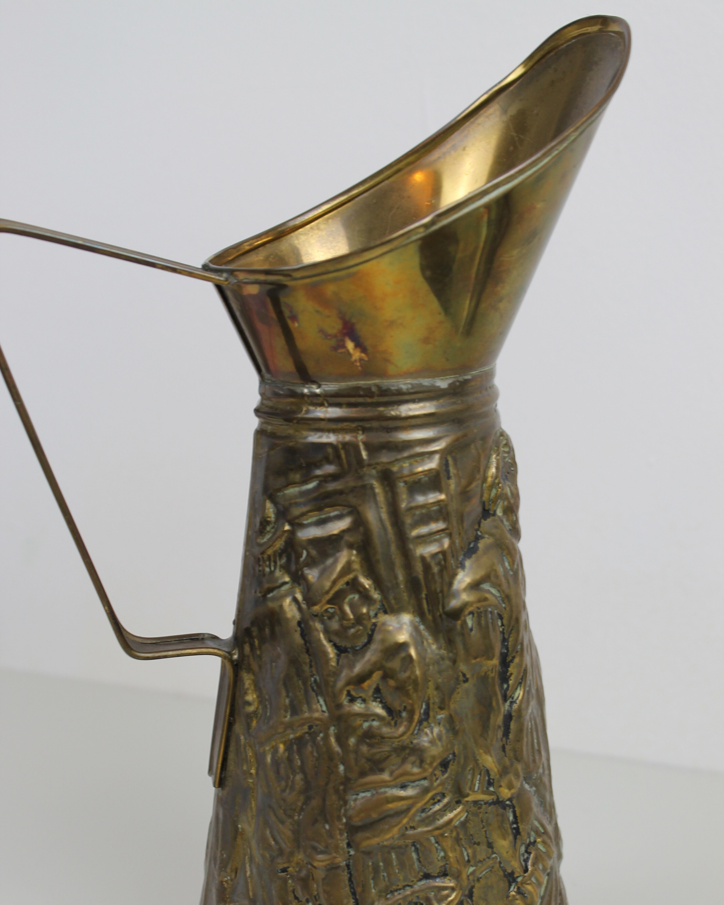 Vintage Brass Relief Pitcher