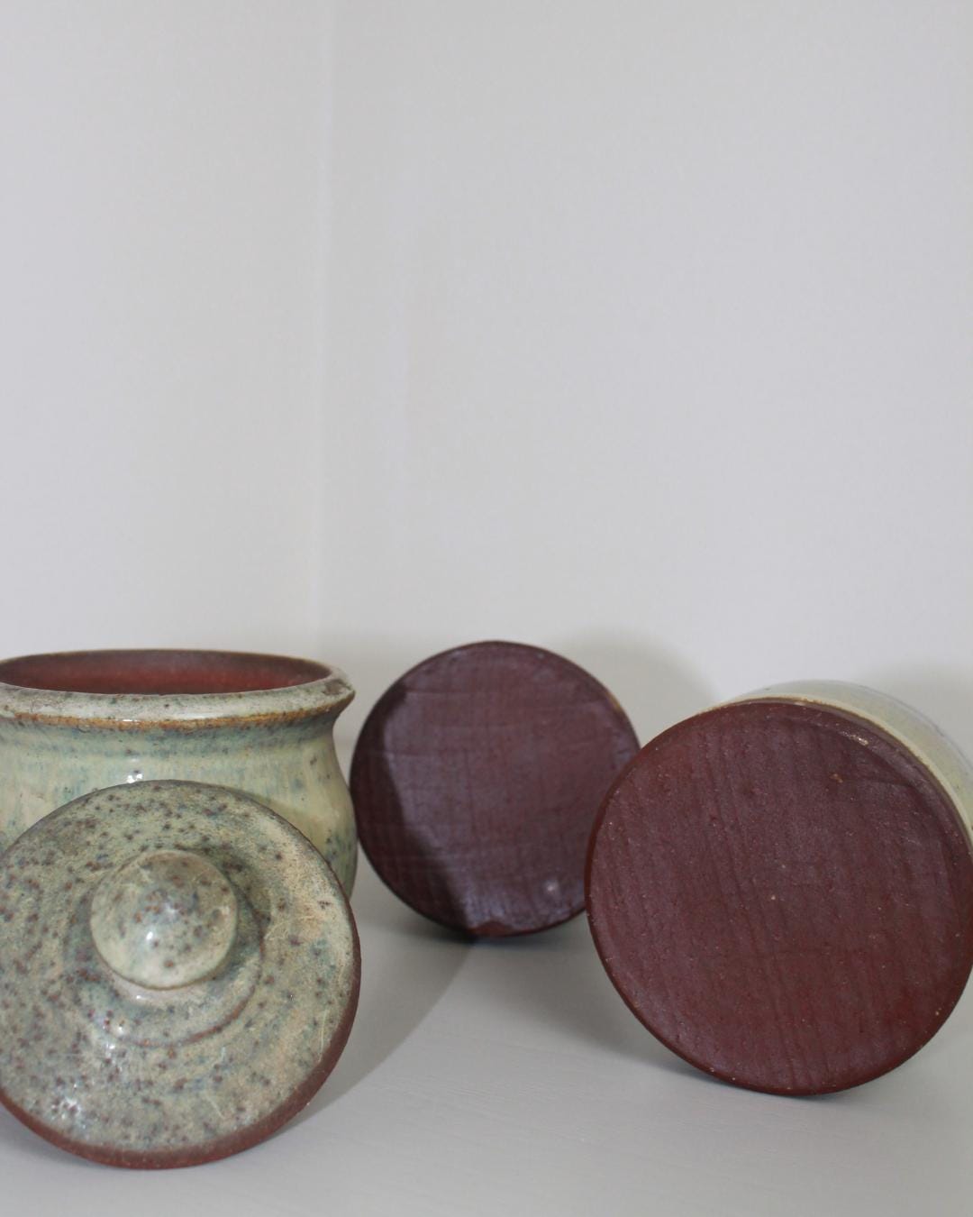 Set of 3 Studio Pottery Jars with Cork & Ceramic Lids, Speckled Green Glaze, 1970s–90s - The Estate