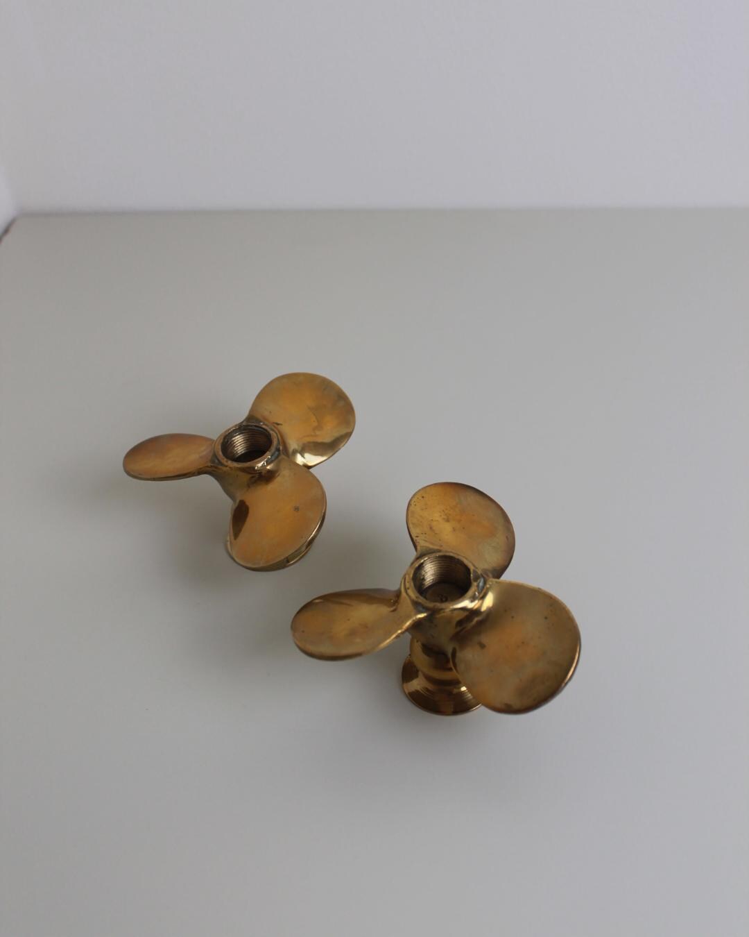 WWI Brass Propeller Candlestick Holders – Trench Art Pair, Sculptural Nautical Form - The Estate