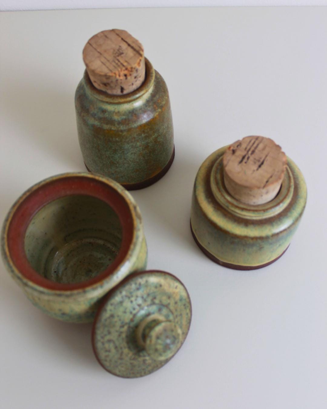 Set of 3 Studio Pottery Jars with Cork & Ceramic Lids, Speckled Green Glaze, 1970s–90s - The Estate