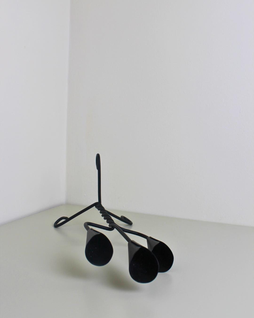 Brutalist Forged Iron Three-Arm Candle Holder, Twisted Stem, 1960s–80s - The Estate